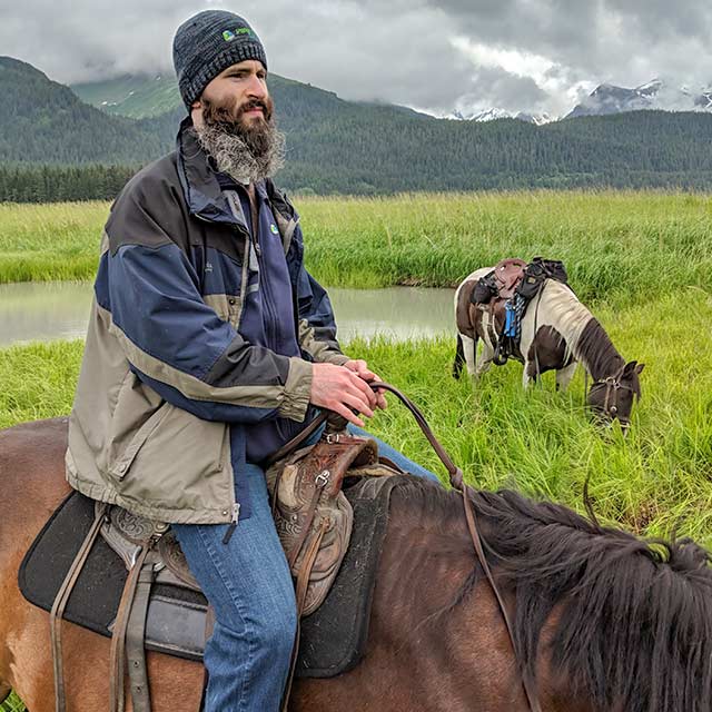 Jon Horseback riding with Bardy's Trail Ride